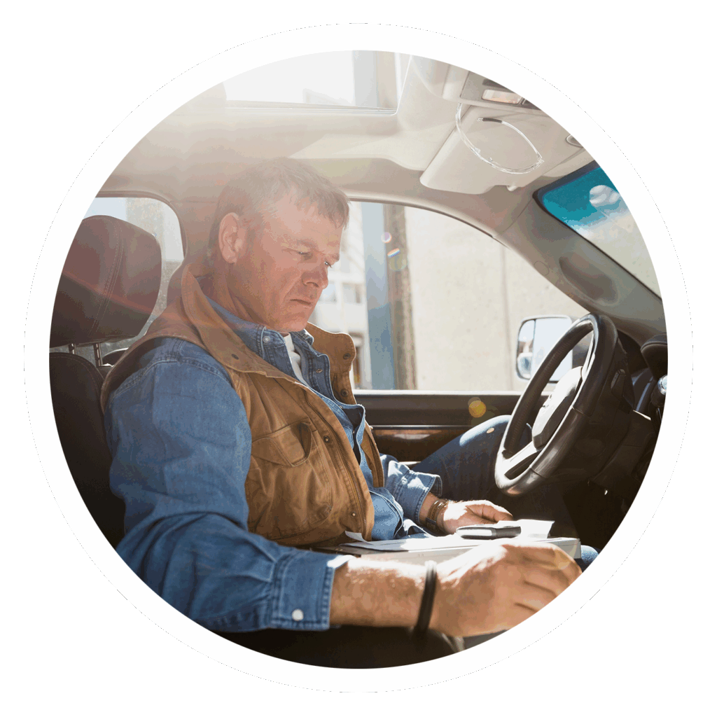Contractor working in truck for Alberta Contractor Marketing